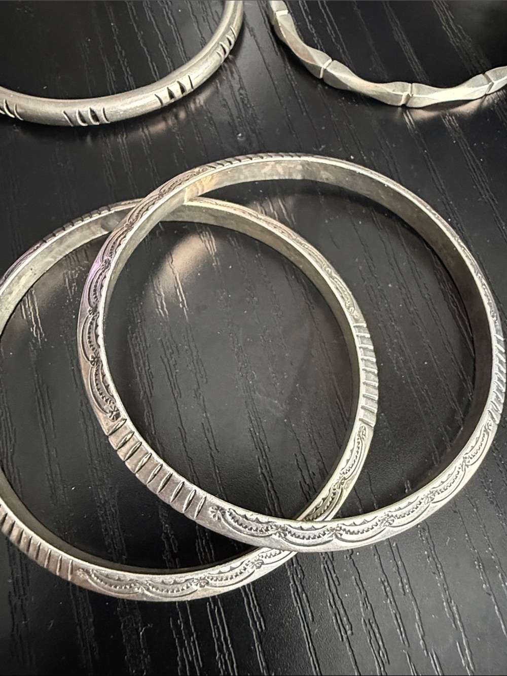 2 silver bracelets